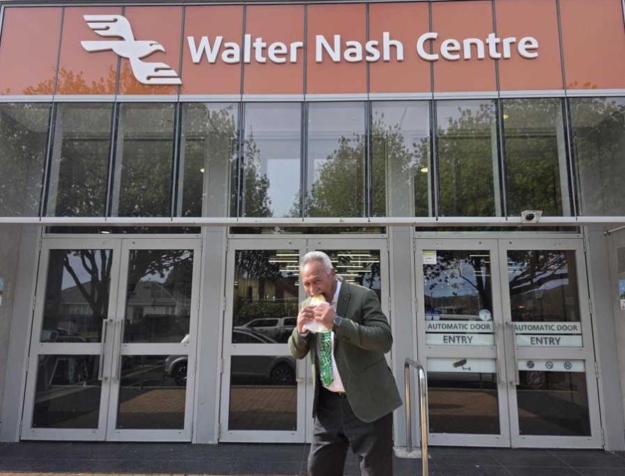 Lower Hutt Mayor Ken Laban with a pie outside Walter Nash Centre, where NZ Pie Fest will run in January.