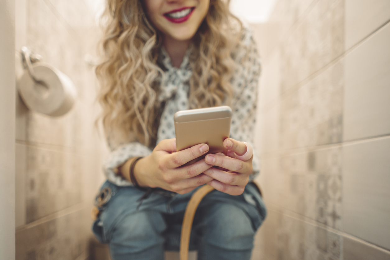 Why sitting on the loo with your phone could harm your health